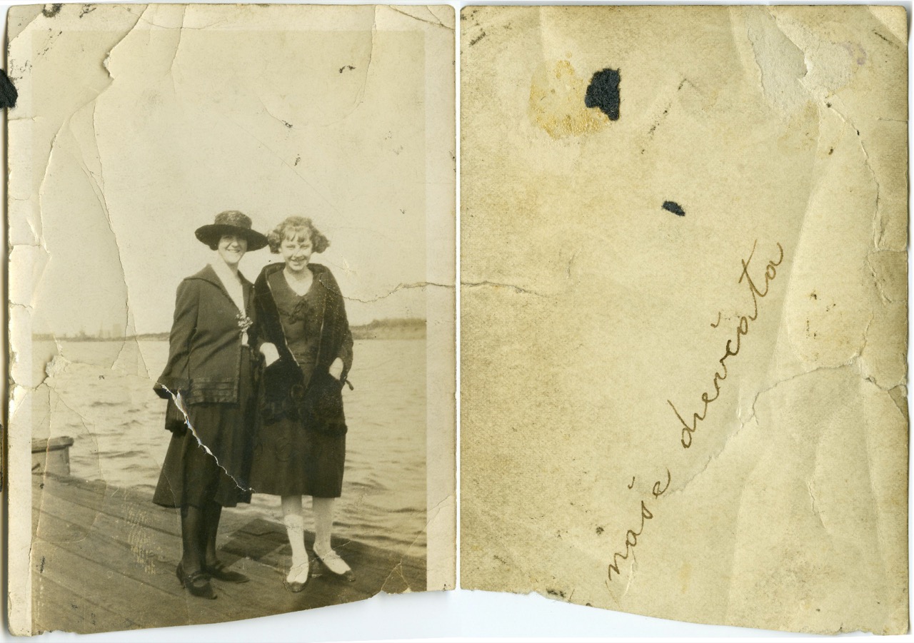 <b>Unknown-2-Women-Standing-Dock-Unknown-on-Reverse</b><br><i>Unknown-2-Women-Standing-Dock-Unknown-on-Reverse</i><br><i>Undated</i>